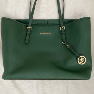 Michael Kors Jet Set Travel Large Tote with gold accents.